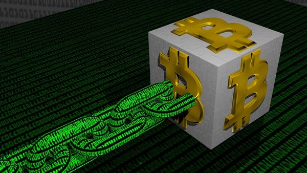 Metal cube with Bitcoin symbols linked to a green stream of code